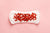 a sanitary pad with red glitter to represent irregular periods