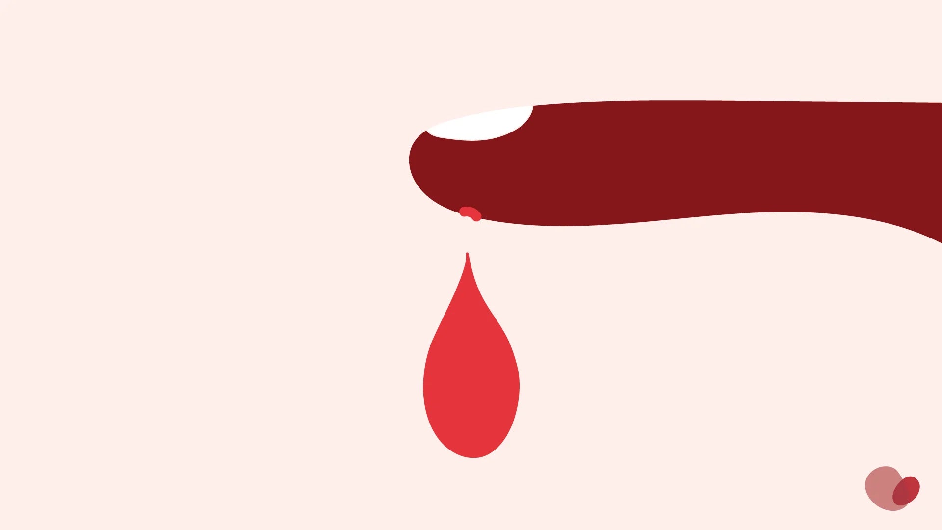 a drop of blood falls from a pricked finger