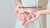 woman holds a model of the female reproductive system
